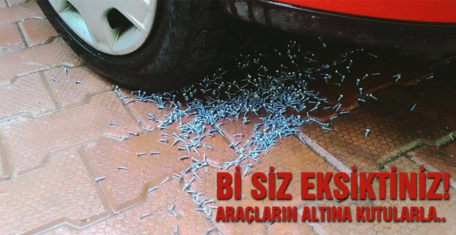 Park halinde ki araçların altına kutularla..